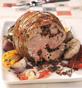 Rolled Shoulder of Lamb with Roasted Red Pepper and Black Olive Butter
