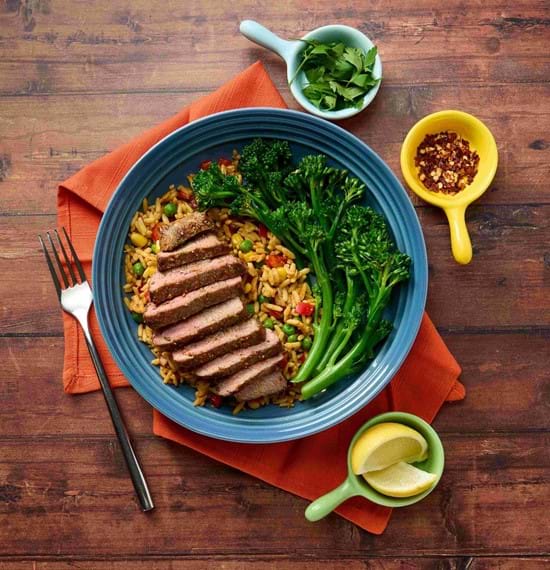 Peri-Peri Lamb Leg Steaks with Spicy Rice and Citrus Herb Dressing Peri-Peri Lamb Leg Steaks with Spicy Rice and Citrus Herb Dressing